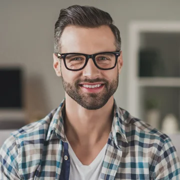 A Happy Mid Age Man at Dental Office